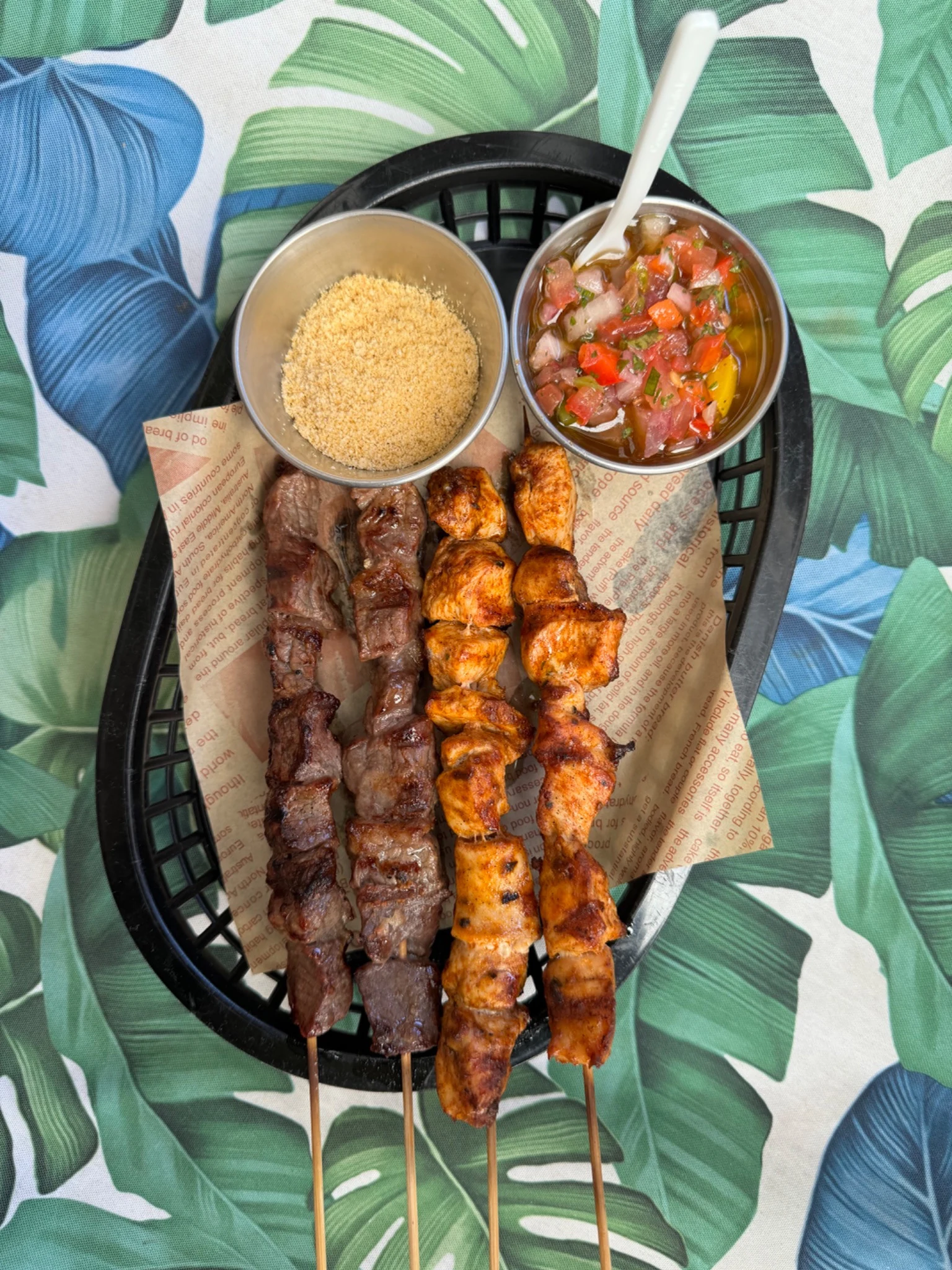 Grilled skewers with sides, photographed from above